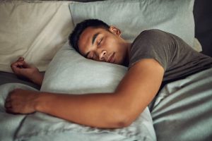 How to Fall Asleep Fast: Stop Fighting It person sleeping comfortably night
