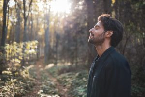 Person exercising outdoors for stress relief